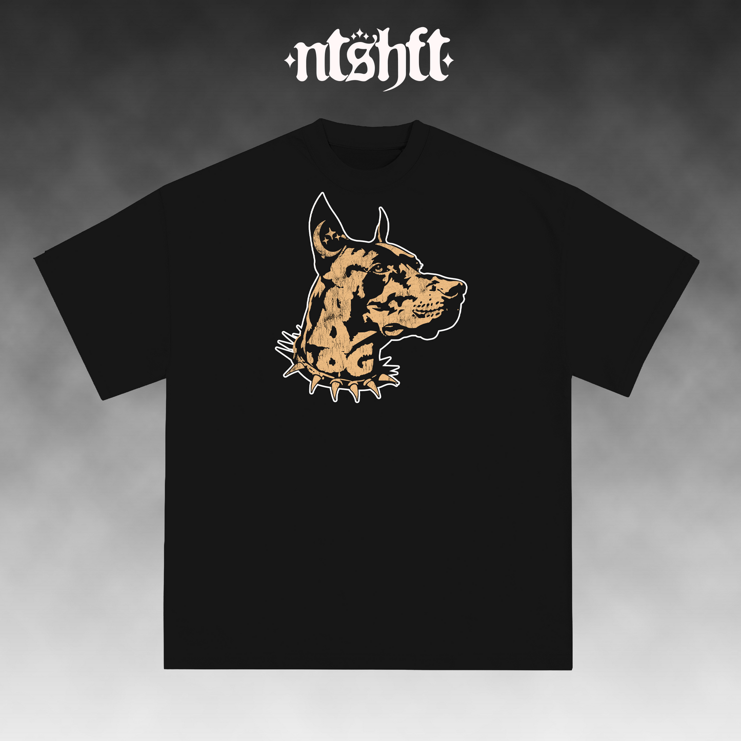 A black short-sleeve t-shirt with a stylized graphic of a dog's head in tan and white on the chest. The brand name 'ntshft' is printed in a white gothic font at the top of the image, set against a dark gray gradient background.
