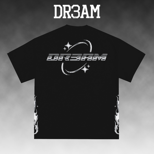 A black short-sleeve t-shirt with a white graphic print on the front featuring the text 'DR3AM' and stylized space-themed elements, shown against a gray gradient background with 'DR3AM' text above.