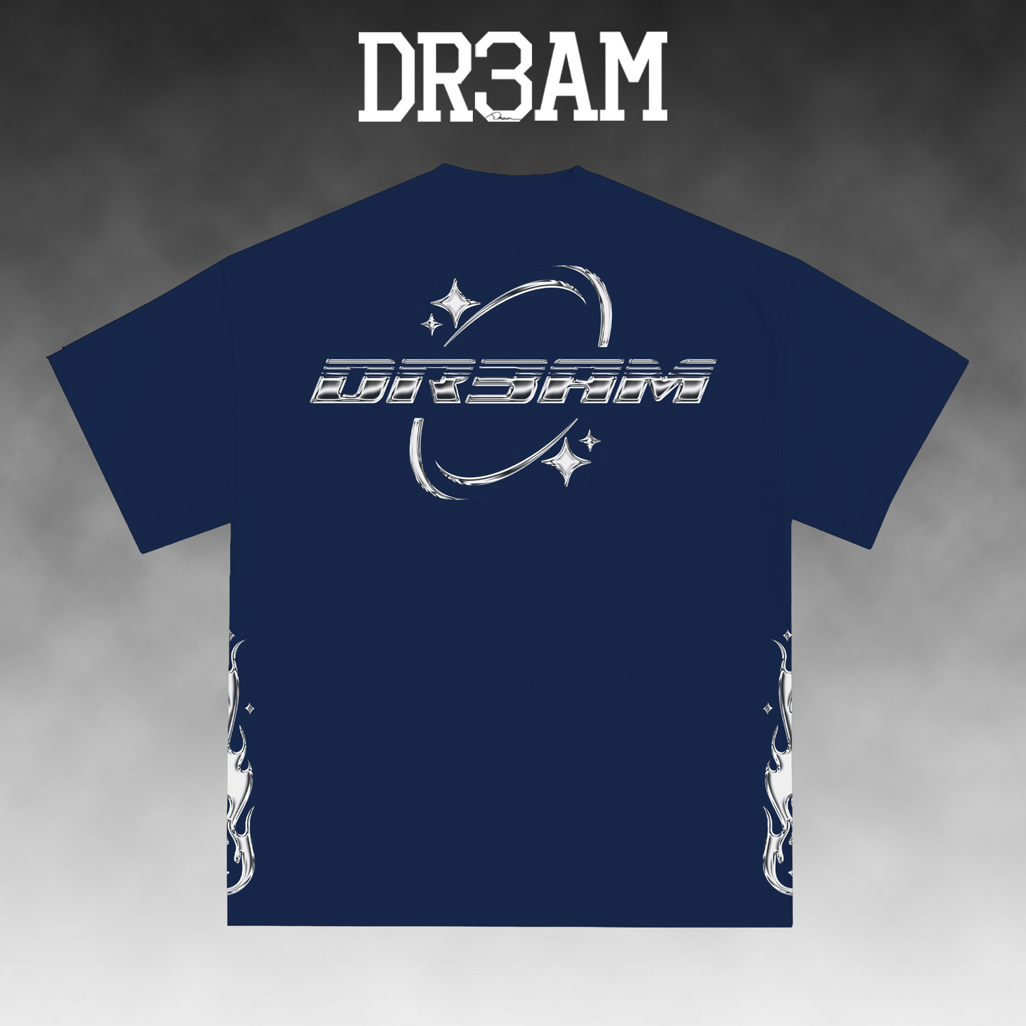 A navy blue t-shirt with a white graphic print on the front featuring stylized text and stars, displayed against a gray gradient background with the text 'DR3AM' at the top.
