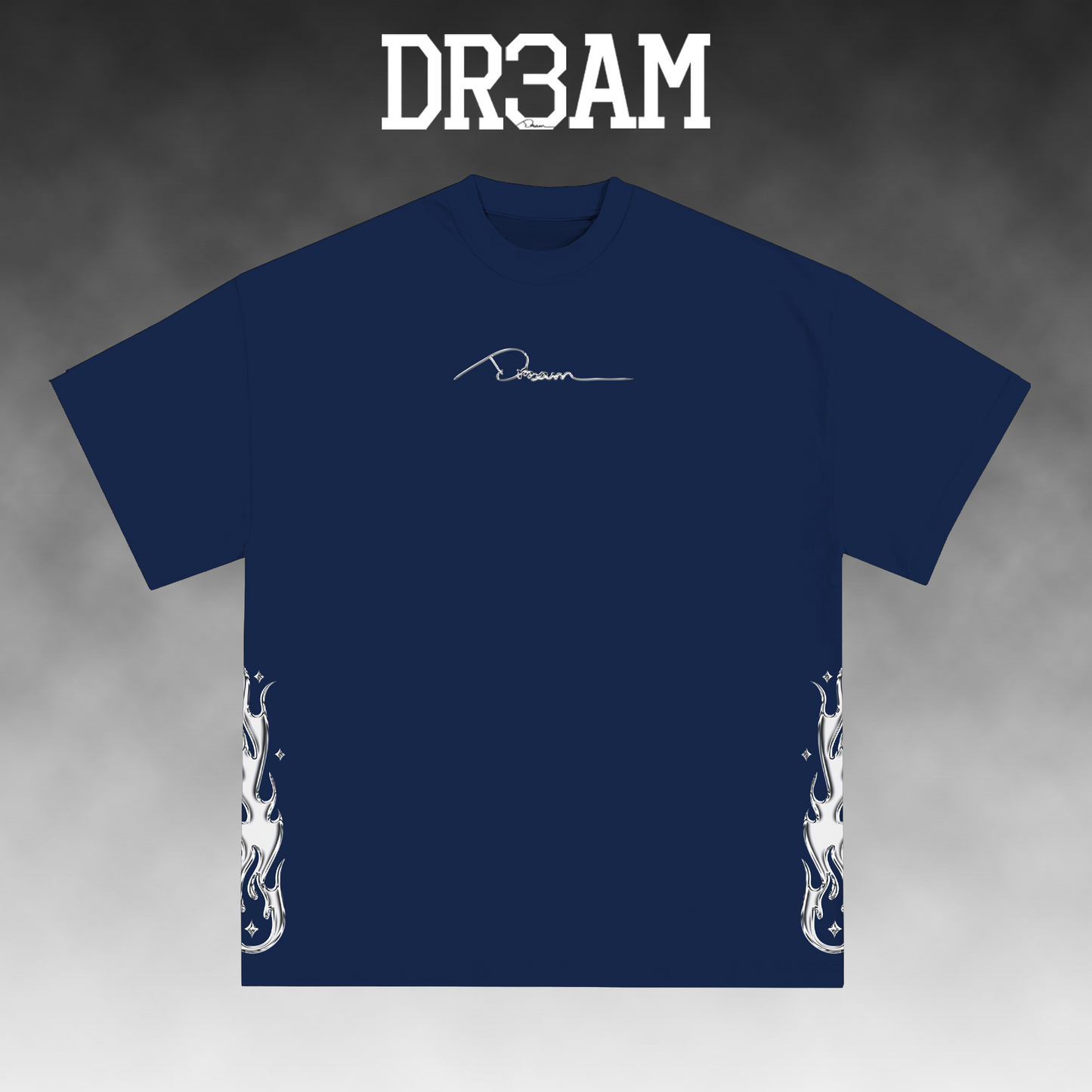 A navy blue short-sleeve t-shirt with a white script logo on the chest and white flame graphics on the lower sleeves, displayed against a gray gradient background with 'DR3AM' text at the top.