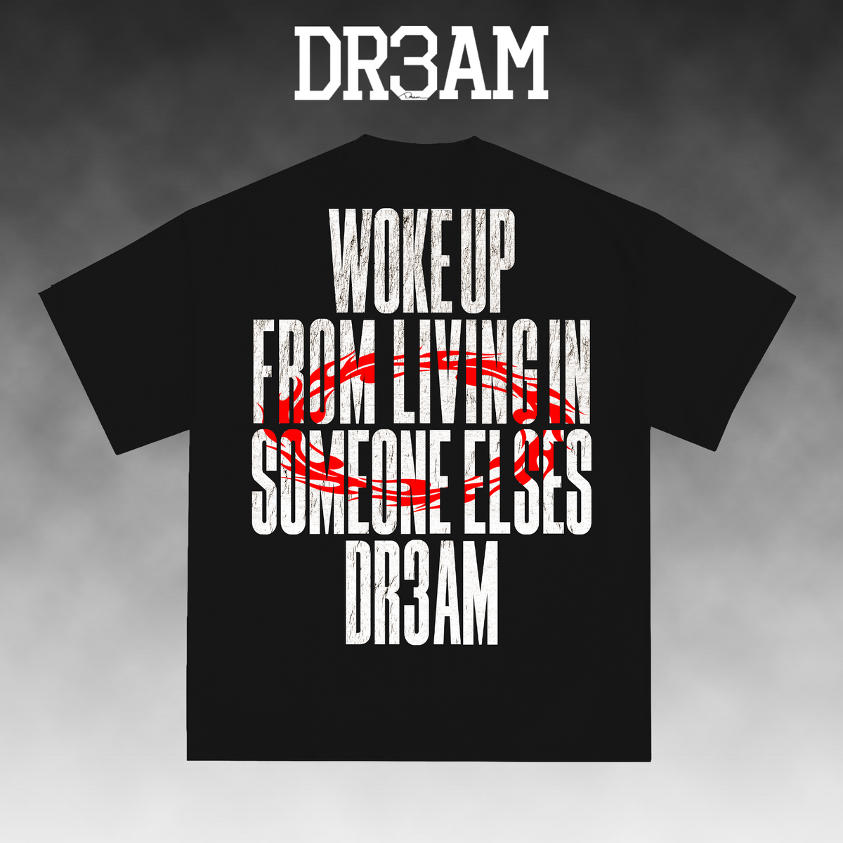 A black short-sleeve t-shirt with a bold graphic print on the front. The design features distressed white text reading 'WOKE UP FROM LIVING IN SOMEONE ELSE'S DR3AM' with a red scribble graphic crossing out 'LIVING IN'.